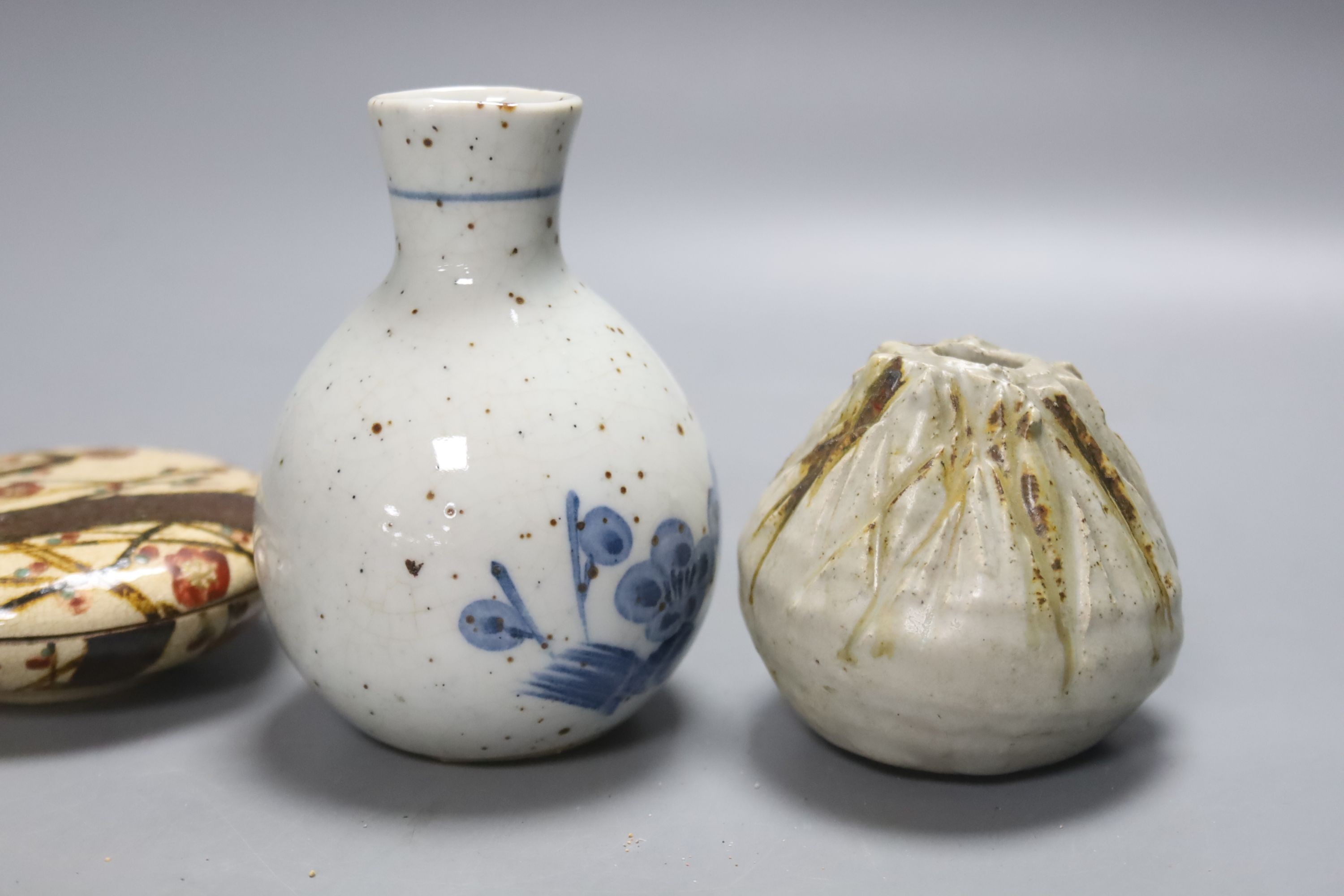 Two Japanese ceramic water droppers and a stoneware box and cover, in the style of Ogata Kenzan, old collection label, tallest 11cm